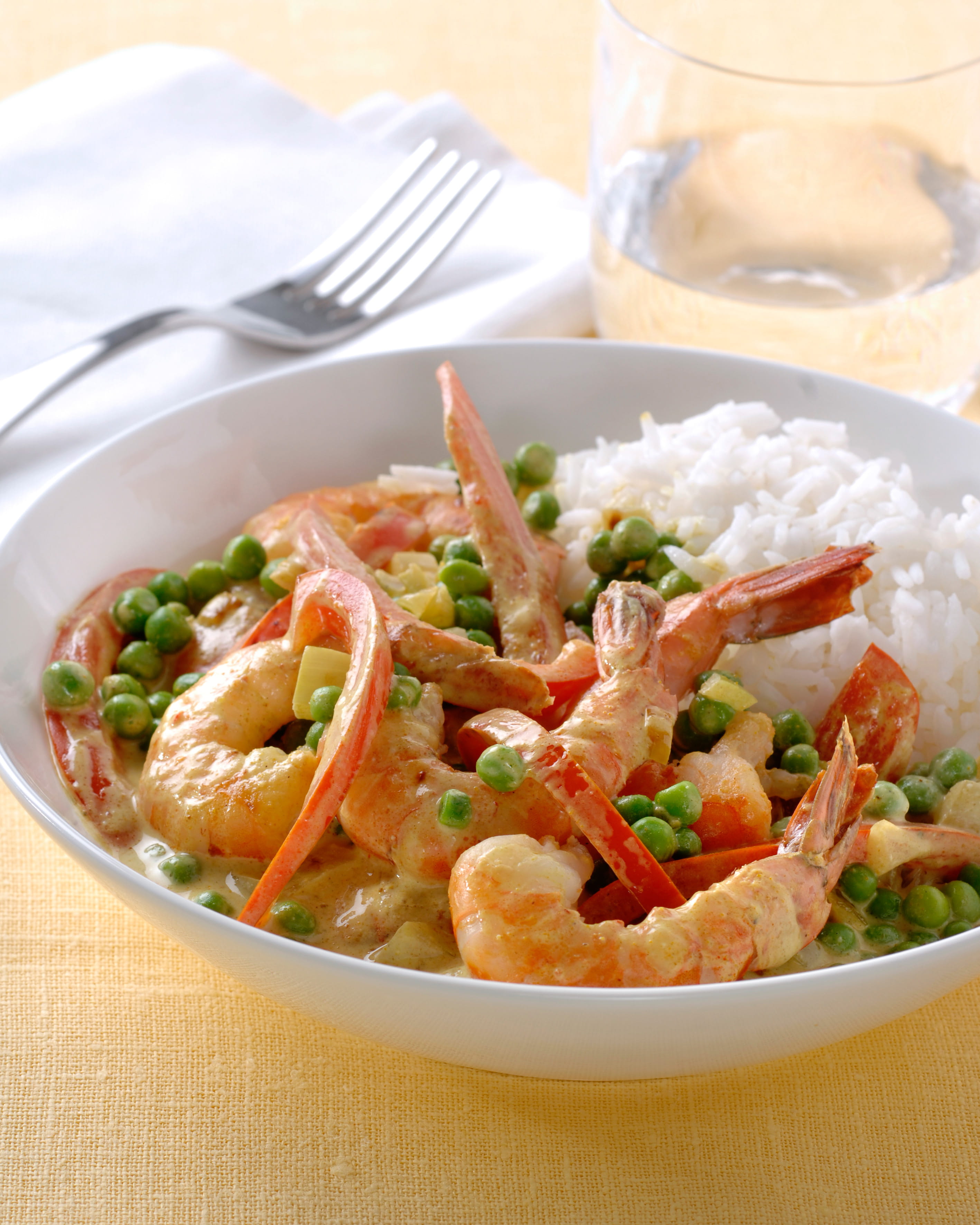 recipe image Curry van garnalen en kokos met witte rijst