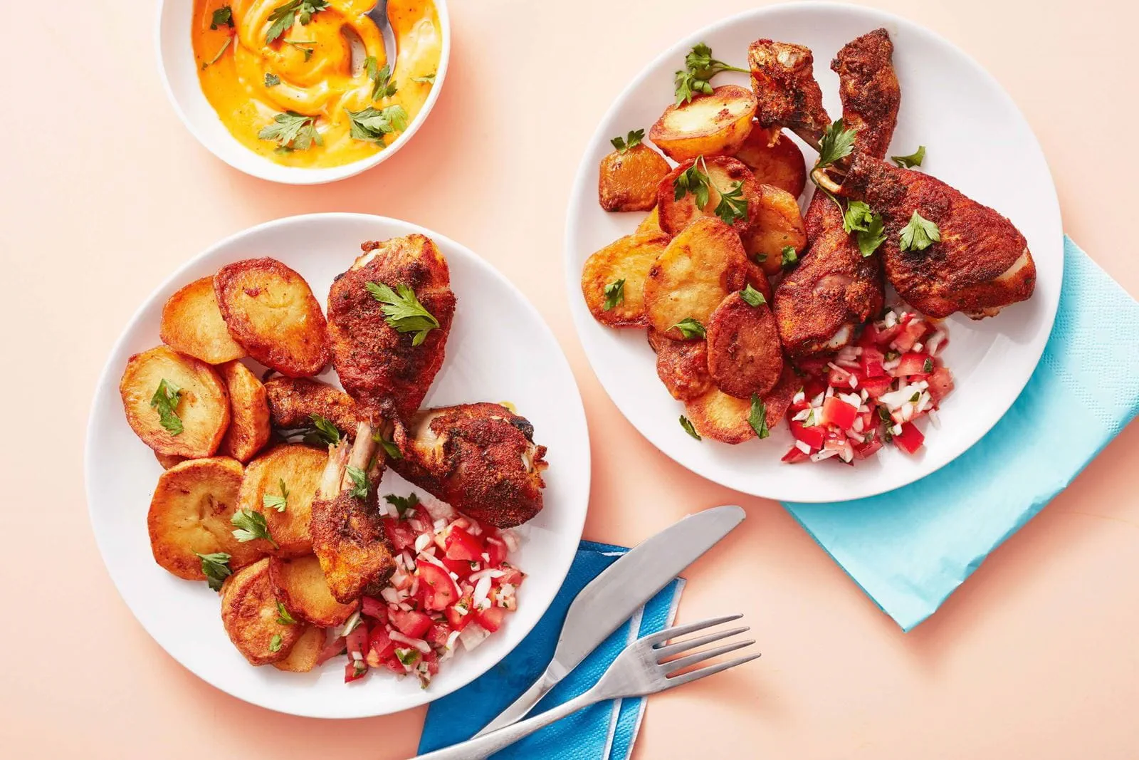 recipe image Gebakken aardappels met gekruide kippenpootjes