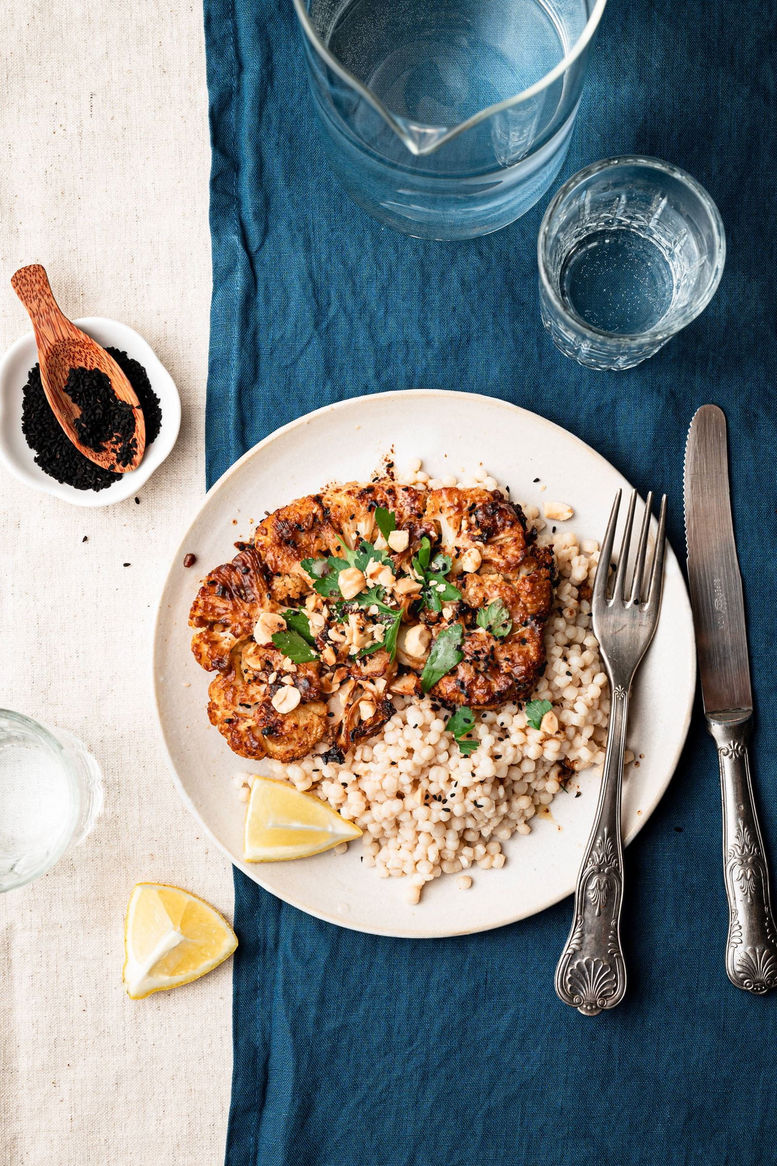 recipe image Geroosterde bloemkool in miso-Roombeter met parelcouscous