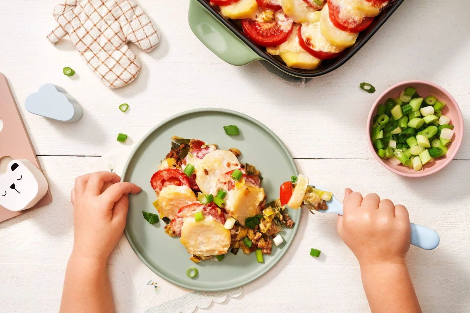 recipe image Vegetarische ovenschotel van aardappel, tomaat en prei