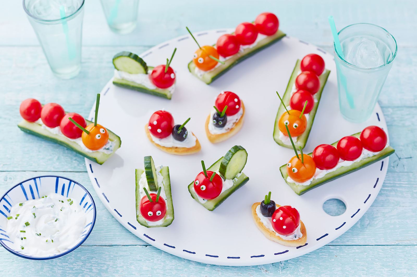 recipe image Rups en Slak van komkommer en cherrytomaten
