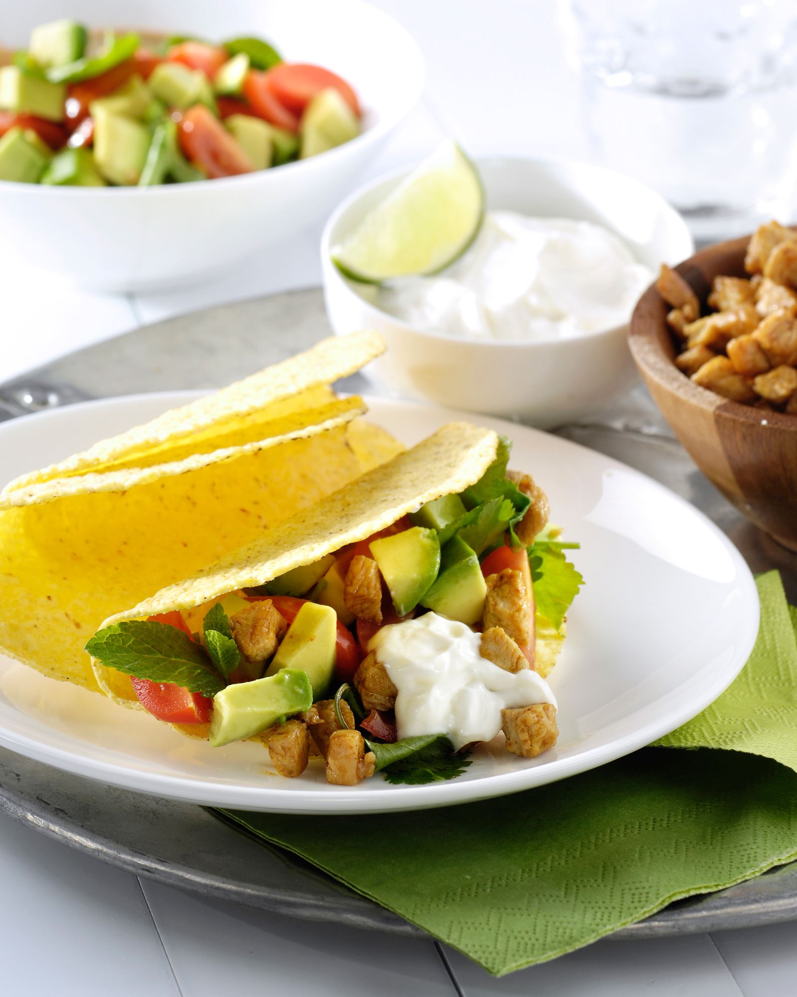 recipe image Frisse taco's met kalkoen en een avocado- en tomatensalade